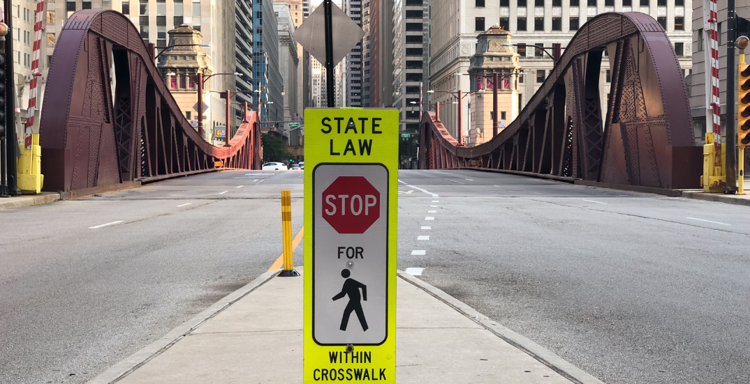 Pedestrian using marked crosswalk safely